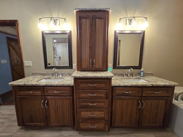 bathroom featuring vanity and tile patterned flooring