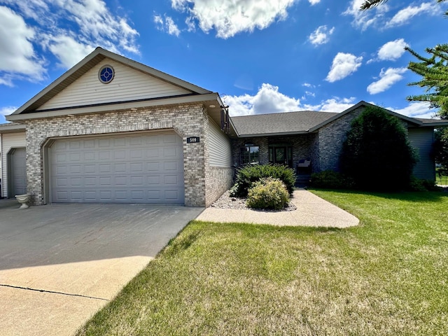 single story home featuring a front lawn and a garage