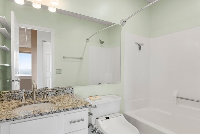 full bathroom with shower / washtub combination, toilet, and vanity