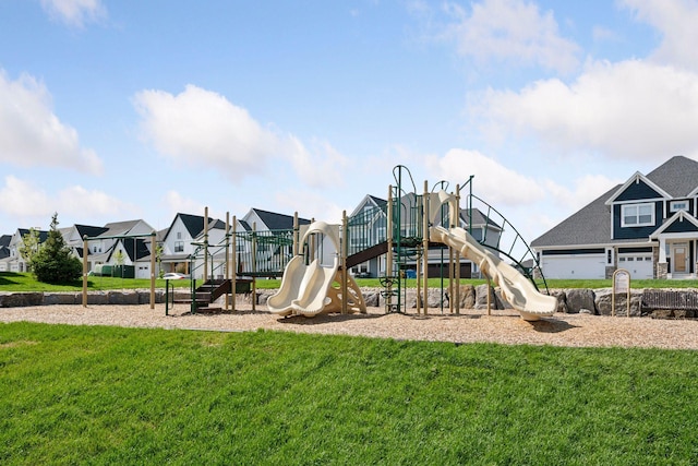 communal playground with a residential view and a lawn