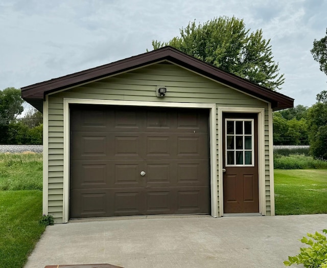 garage with a yard