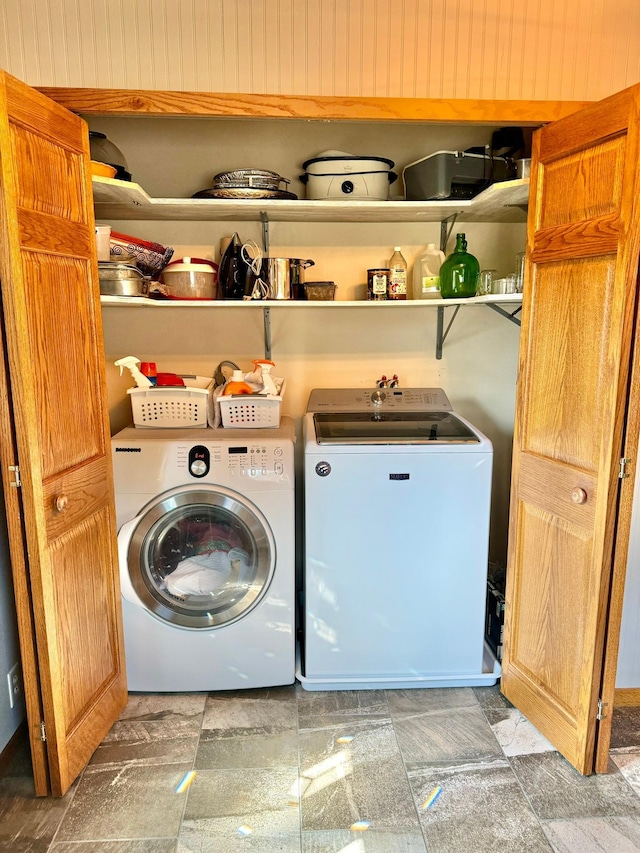 laundry area with washer and clothes dryer