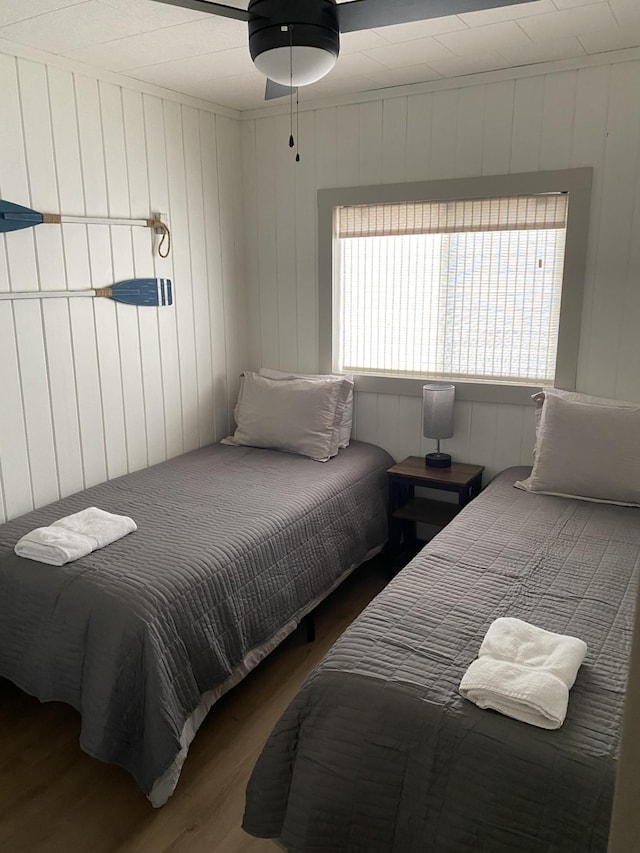 bedroom featuring wood finished floors