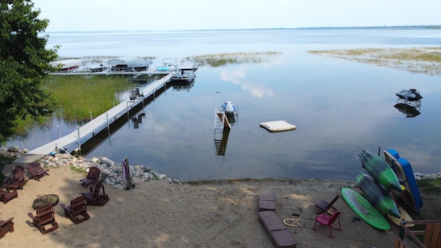 dock area featuring a water view