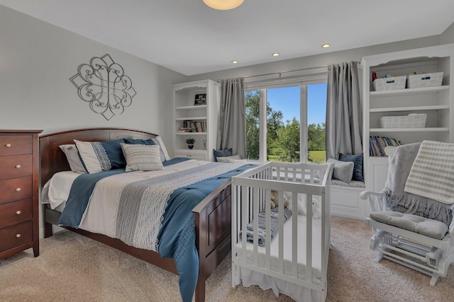 bedroom featuring recessed lighting and light carpet