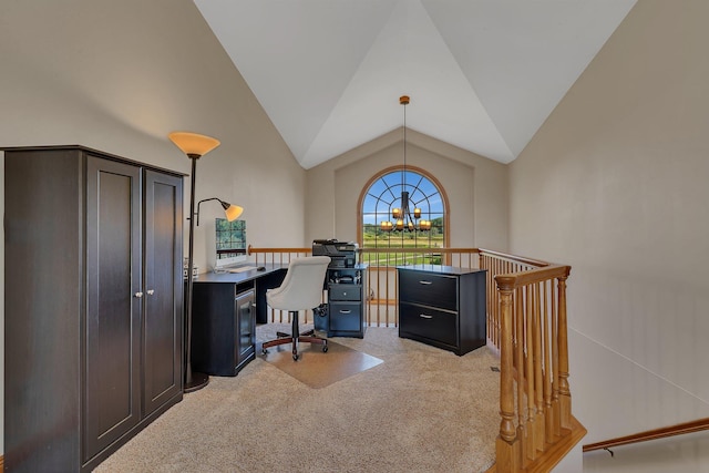 office area featuring a chandelier and vaulted ceiling