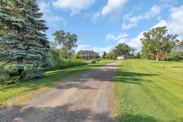 view of street featuring driveway