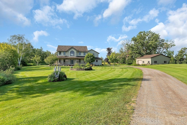 view of front of property with a front yard and dirt driveway