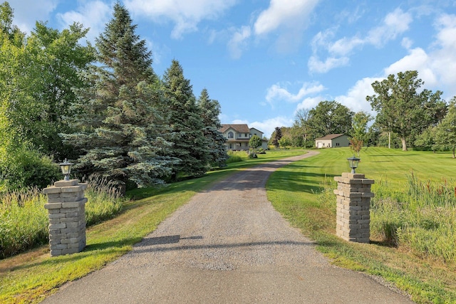 view of street featuring driveway