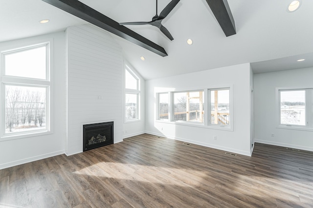 unfurnished living room with ceiling fan, high vaulted ceiling, a fireplace, beamed ceiling, and wood-type flooring