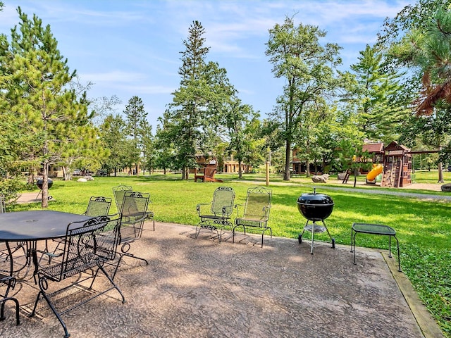 view of patio with a playground