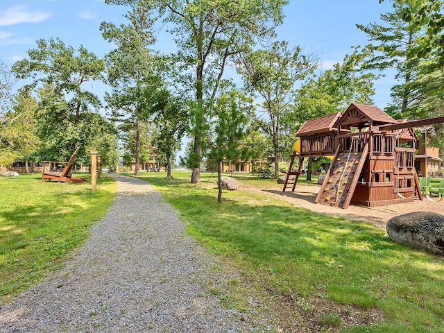 view of play area featuring a lawn