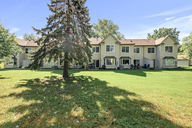 view of front of home with a front lawn