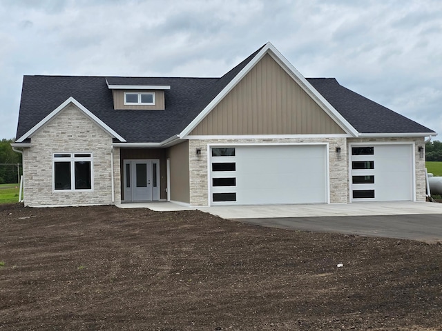 craftsman inspired home featuring a garage