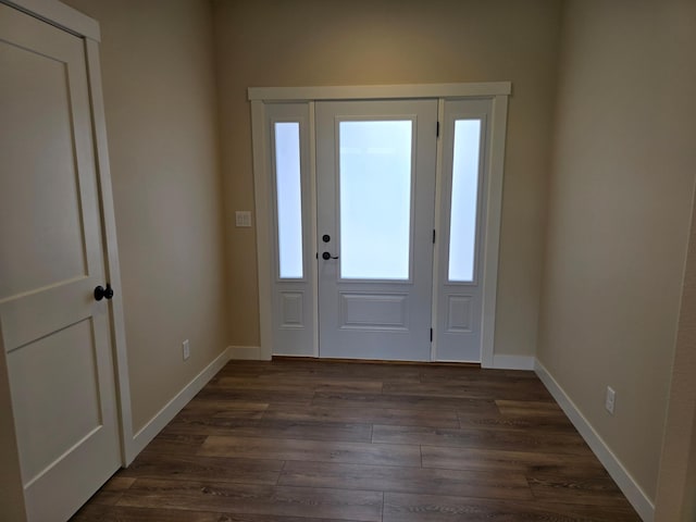 foyer with dark hardwood / wood-style flooring