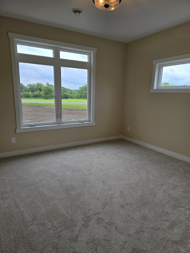 view of carpeted spare room