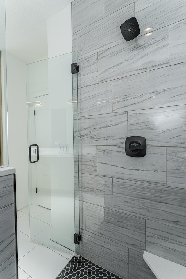 bathroom with an enclosed shower