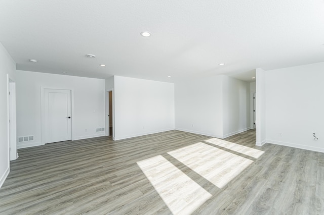 empty room featuring light hardwood / wood-style floors