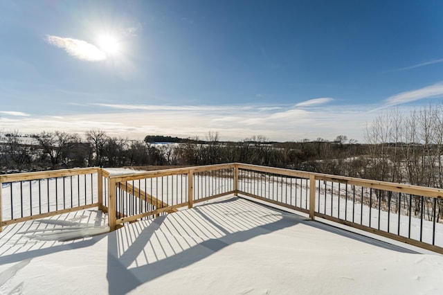 view of snow covered deck