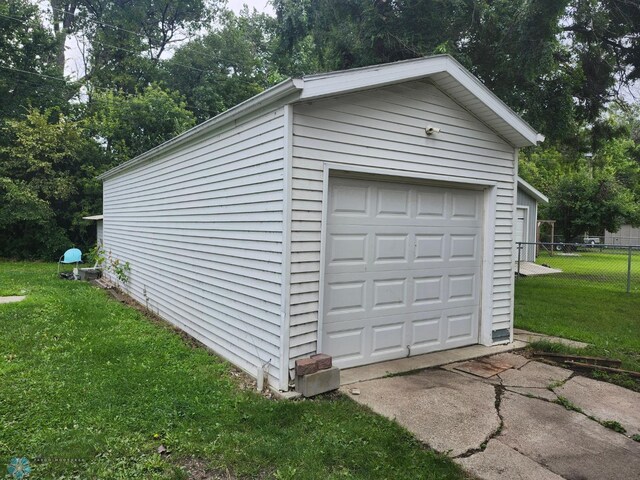 garage with a yard