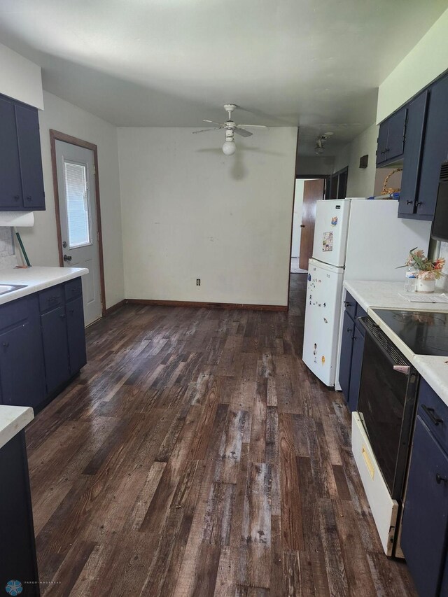 kitchen with ceiling fan, blue cabinets, and wood-type flooring