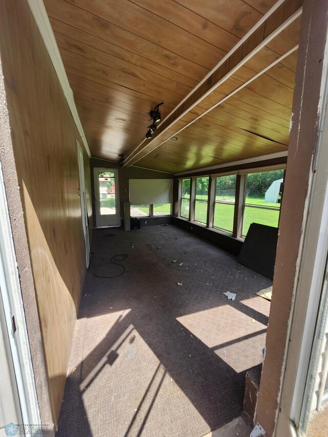 interior space with wooden ceiling