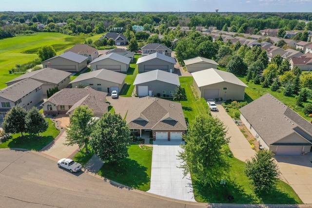 birds eye view of property with a residential view