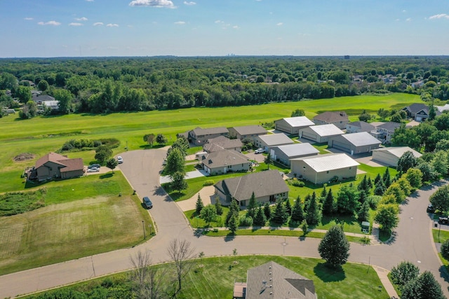 bird's eye view with a forest view and a residential view