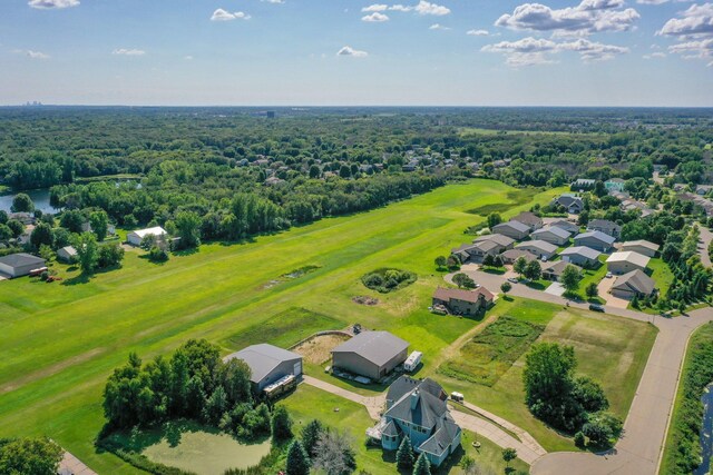 aerial view featuring a view of trees