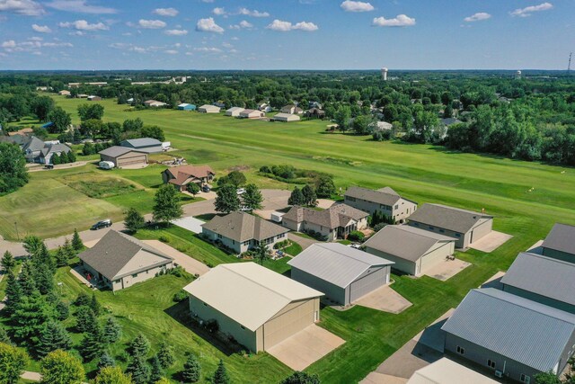 aerial view featuring golf course view and a residential view