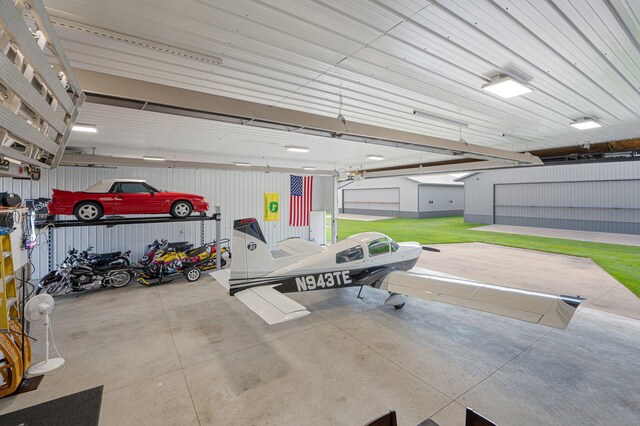 garage featuring metal wall