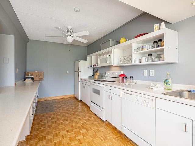 kitchen featuring ceiling fan, white cabinetry, white appliances, and light parquet floors