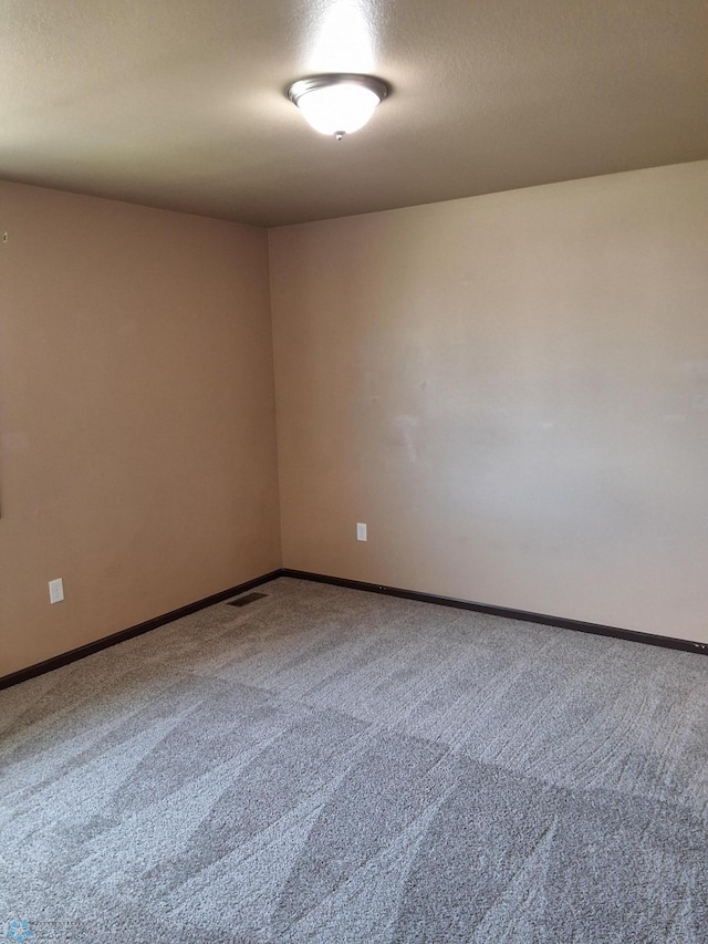 915 30th Ave W, West Fargo, ND 58078 - carpeted spare room with baseboards