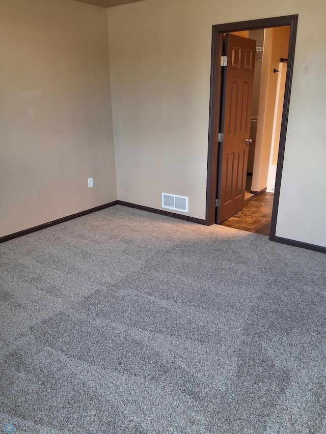 915 30th Ave W, West Fargo, ND 58078 - carpeted spare room featuring baseboards