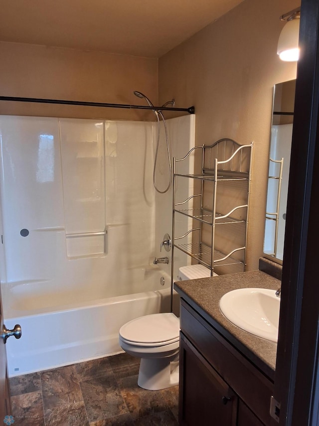 915 30th Ave W, West Fargo, ND 58078 - bathroom with shower / washtub combination, vanity, and stone finish floors
