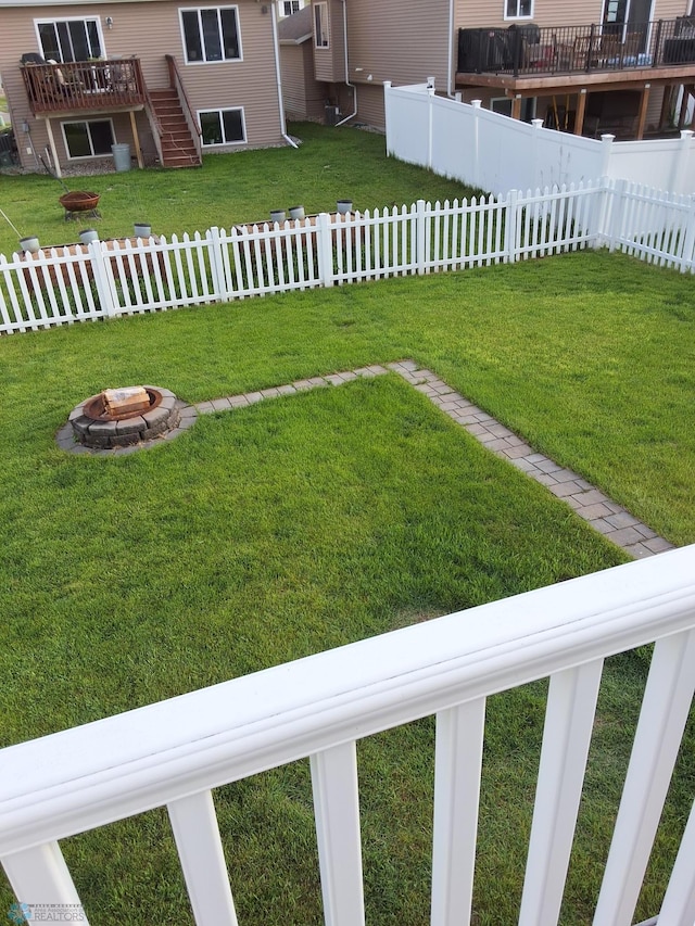 915 30th Ave W, West Fargo, ND 58078 - view of yard with a fire pit and stairway