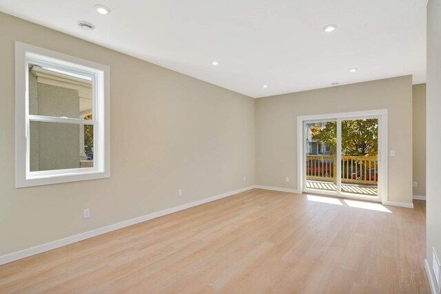 empty room featuring light hardwood / wood-style floors