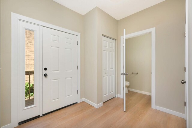 foyer entrance featuring light wood-type flooring