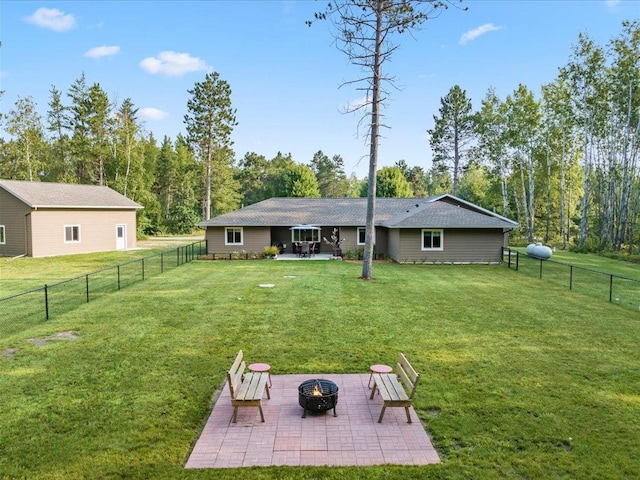 view of yard with an outdoor fire pit and a patio area