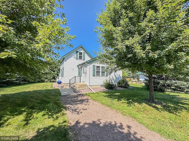 view of front of home with a front lawn