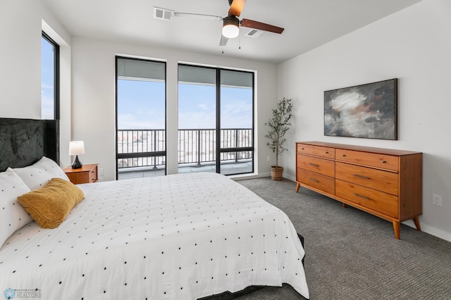 bedroom with ceiling fan, dark carpet, and access to outside