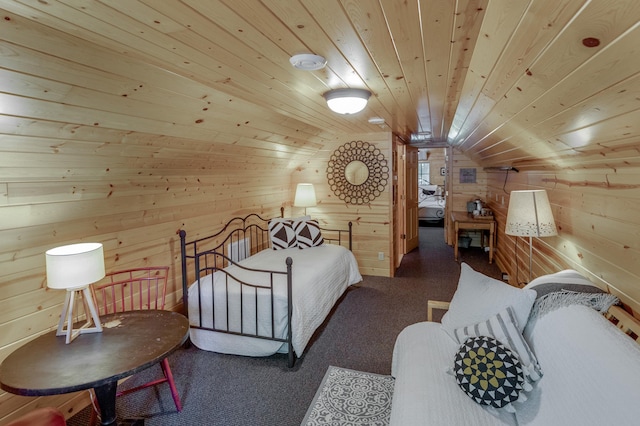 bedroom featuring wood walls, wood ceiling, and vaulted ceiling