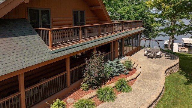 back of property featuring a patio area