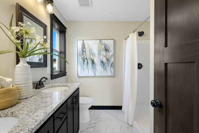 bathroom with vanity, toilet, walk in shower, and tile patterned floors