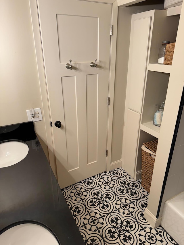 bathroom featuring tile patterned flooring