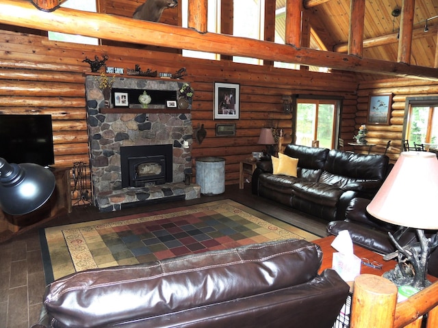 living room featuring high vaulted ceiling, hardwood / wood-style floors, rustic walls, and beam ceiling