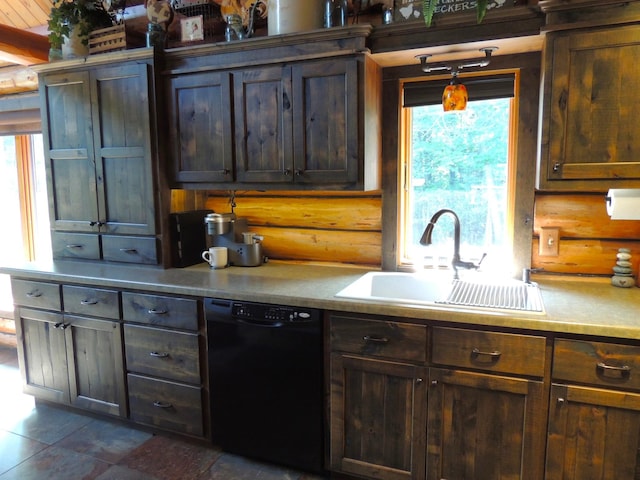 kitchen with dark brown cabinetry, dishwasher, hanging light fixtures, and sink