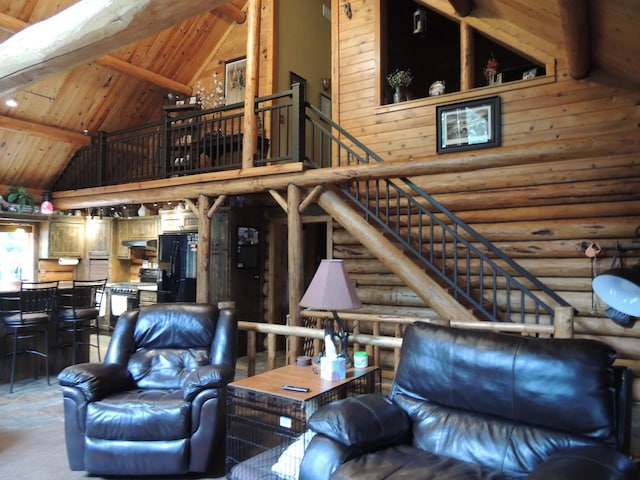 20578 317th St, Farming Twp, MN 56310 - living area featuring wood ceiling, high vaulted ceiling, beam ceiling, log walls, and stairs