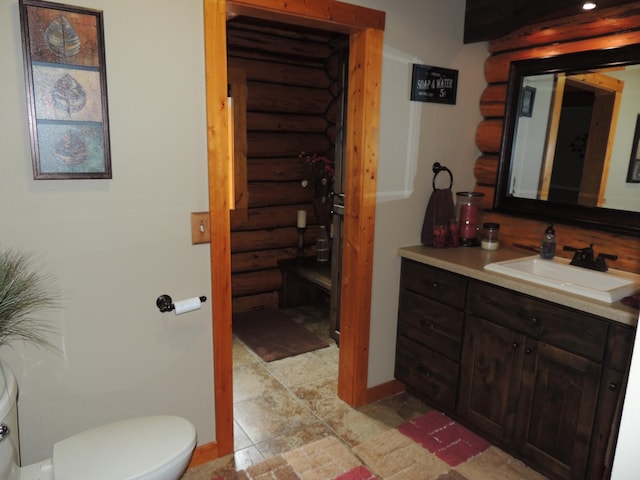 20578 317th St, Farming Twp, MN 56310 - half bath featuring vanity, toilet, baseboards, and log walls