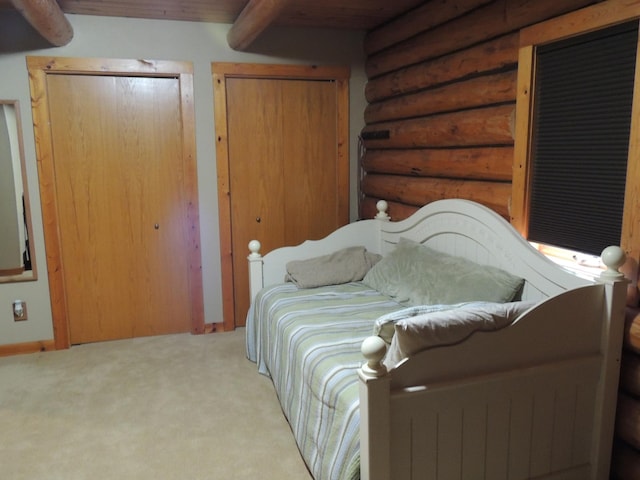 20578 317th St, Farming Twp, MN 56310 - carpeted bedroom featuring log walls and beamed ceiling